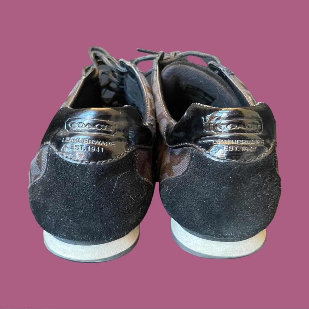 Coach black signature C sneakers in size 10.
